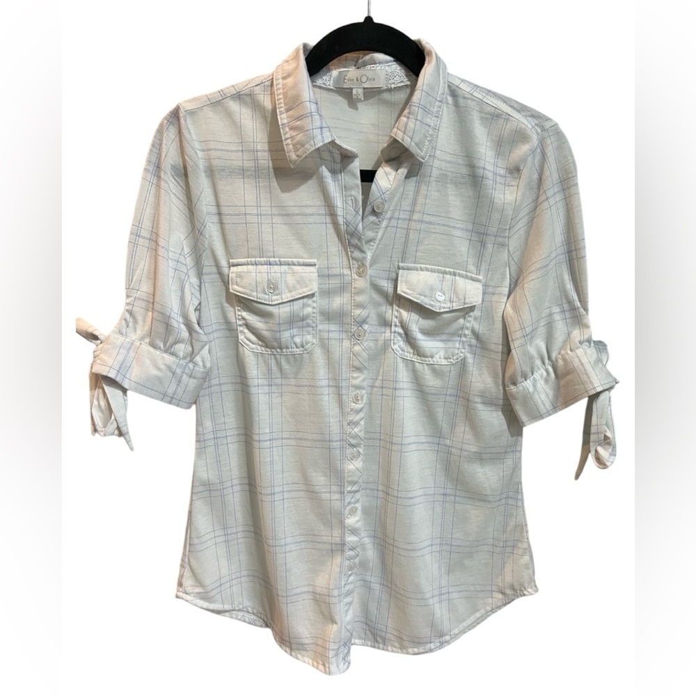 Button down short sleeve shirt with ties on the arm